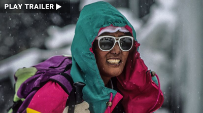Trailer for documentary "PASANG: In the Shadow of Everest" directed by Nancy Svendsen. Close up of woman in snow hiking gear. https://vimeo.com/821794951