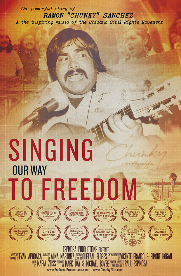 Film poster for "Singing Our Way To Freedom" with man playing guitar and singing.