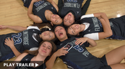 Trailer for documentary “Home court” directed by Erica Tanamachi. Girls lie on the floor and look at the camera, smiling. 