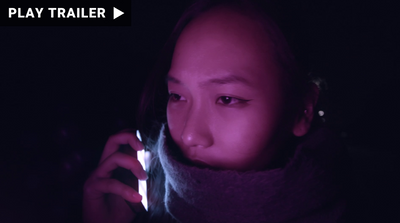 Documentary Trailer "GUARDIANS" directed by Minerva. A woman illuminated by her phone in the night. https://vimeo.com/933465791