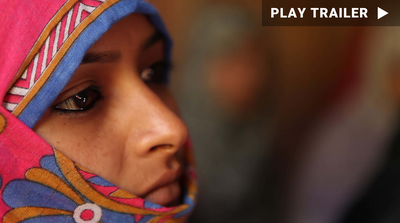  “Holy Rights” directed by Farha Khatun. A close up of a woman looking to the right of frame. https://vimeo.com/867001811