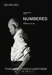  Film poster for "NUMBERED". An elderly man stands on a black background.