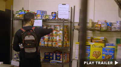 Trailer for documentary "Hungry to Learn" directed by Geeta Gandbhir. Man reaching for canned food in pantry. https://vimeo.com/390097098