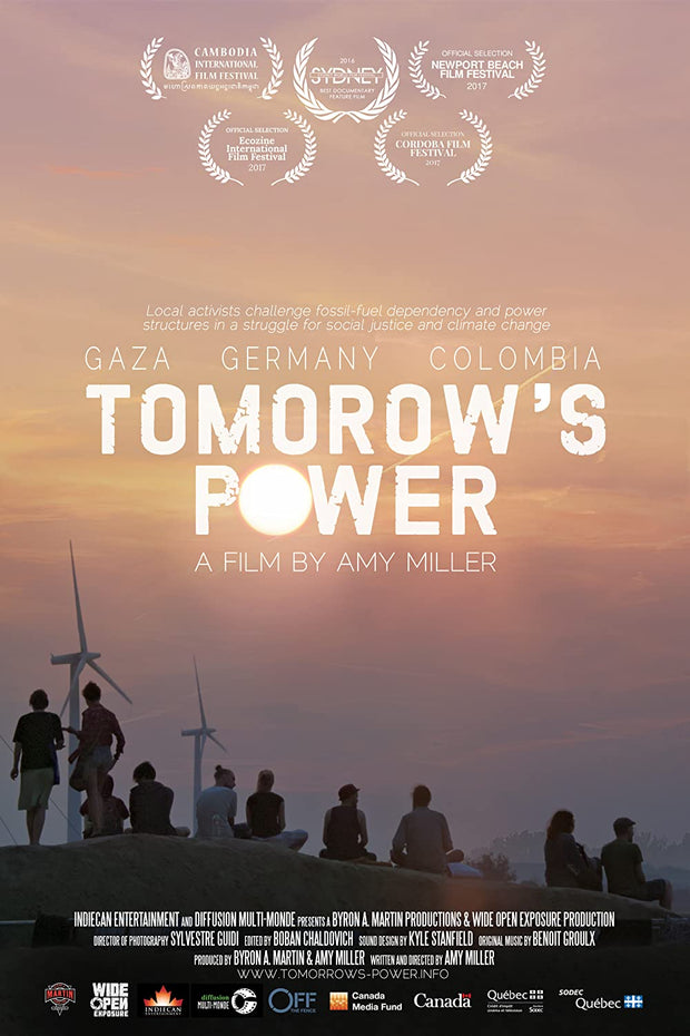 Film poster for "Tomorrow's Power" with group of people sitting on hill watching sunset.