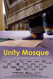 Film poster for "Unity Mosque" with rainbow socks next to mat.
