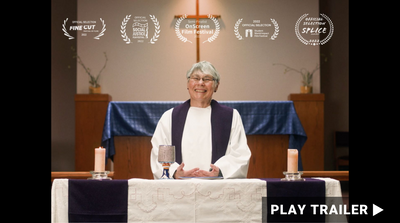 Trailer for documentary "The Forbidden Call" directed by AnaMichele Morejon. Woman smiling in front of altar in church. https://vimeo.com/754022418
