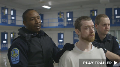 Trailer for documentary "Solitary" directed by Kristi Jacobson. Two officers holding on prisoner. https://vimeo.com/204435006