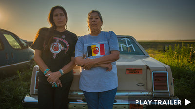 Trailer for documentary "Warrior Women" directed by Christina D. King & Elizabeth A. Castle. Two women standing in front of car on grassland. https://vimeo.com/301097219